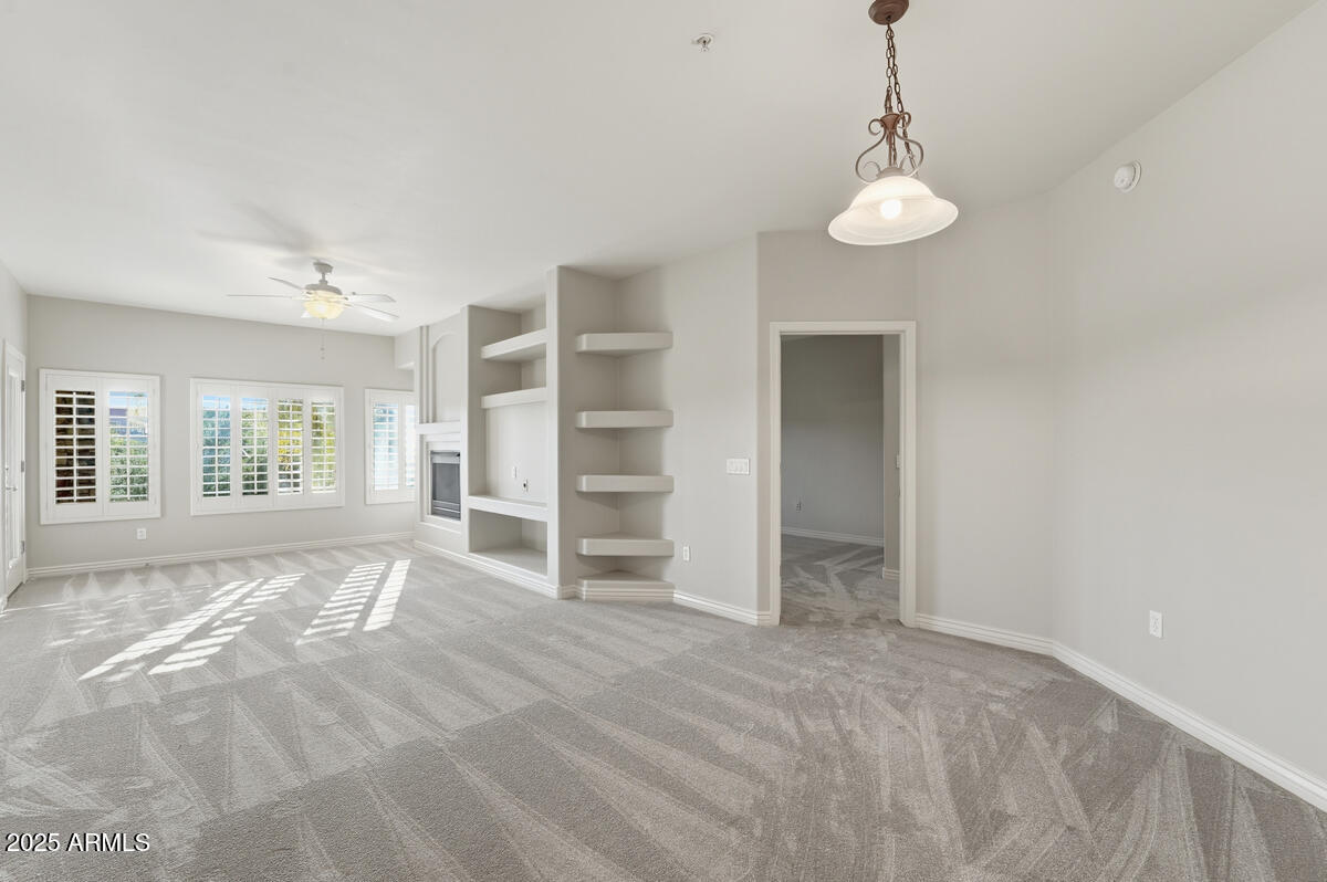 5450 East Deer Valley Drive, Unit 2024 Phoenix, AZ 85054 - Photo 11 of 50 a view of an empty room with a window