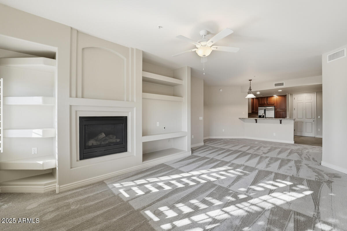 5450 East Deer Valley Drive, Unit 2024 Phoenix, AZ 85054 - Photo 14 of 50 a view of a livingroom with a fireplace