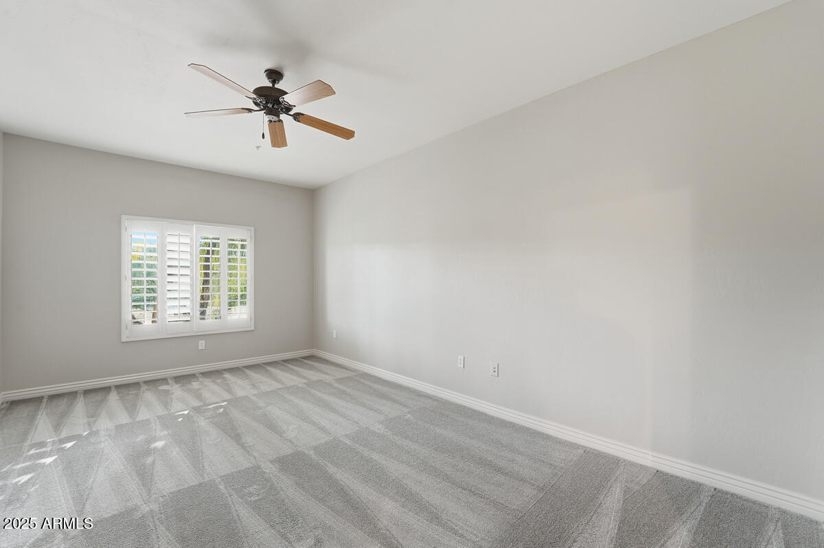 5450 East Deer Valley Drive, Unit 2024 Phoenix, AZ 85054 - Photo 20 of 50 a view of an empty room with a window
