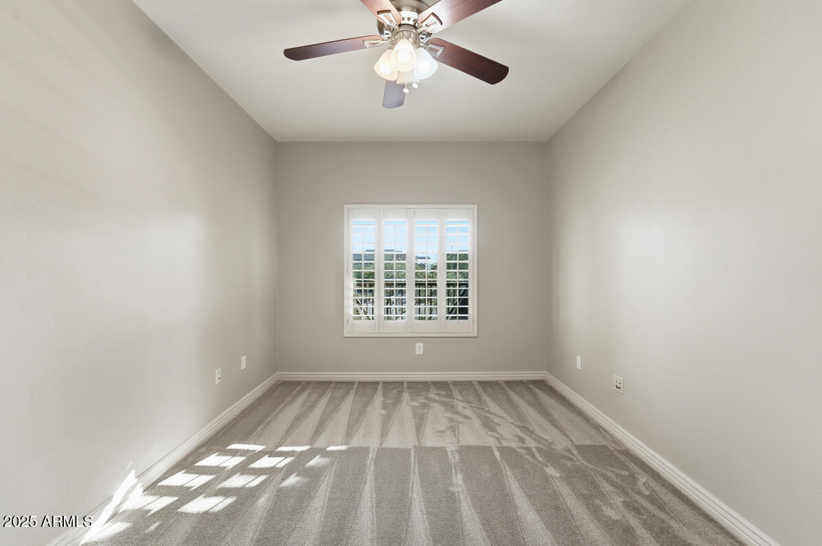 5450 East Deer Valley Drive, Unit 2024 Phoenix, AZ 85054 - Photo 29 of 50 a view of an empty room with a window