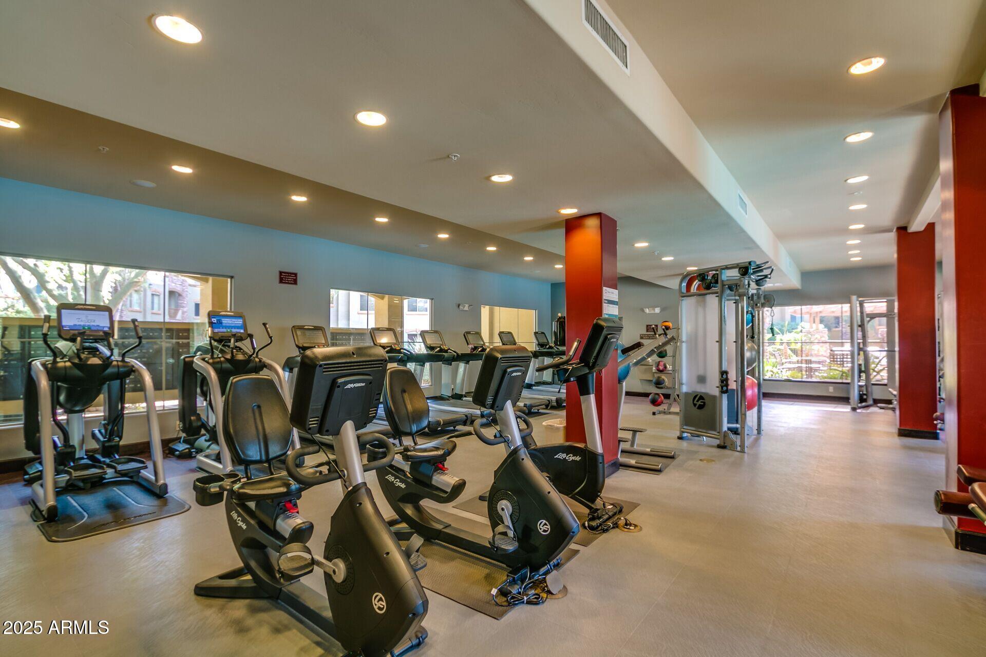 5450 East Deer Valley Drive, Unit 2024 Phoenix, AZ 85054 - Photo 43 of 50 a view of a room with gym equipment