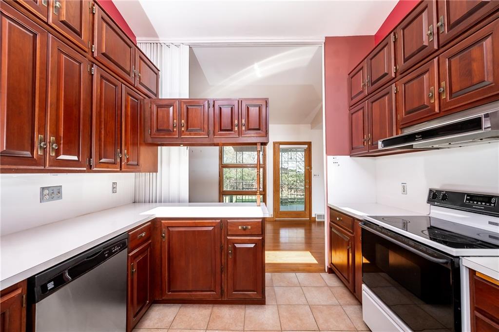 200 Church Avenue Indiana, PA 15701 - Photo 13 of 37 a kitchen with stainless steel appliances granite countertop a stove a sink and a microwave