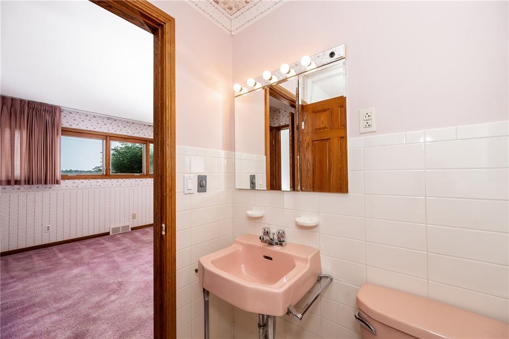 200 Church Avenue Indiana, PA 15701 - Photo 16 of 37 a bathroom with a sink a toilet and mirror