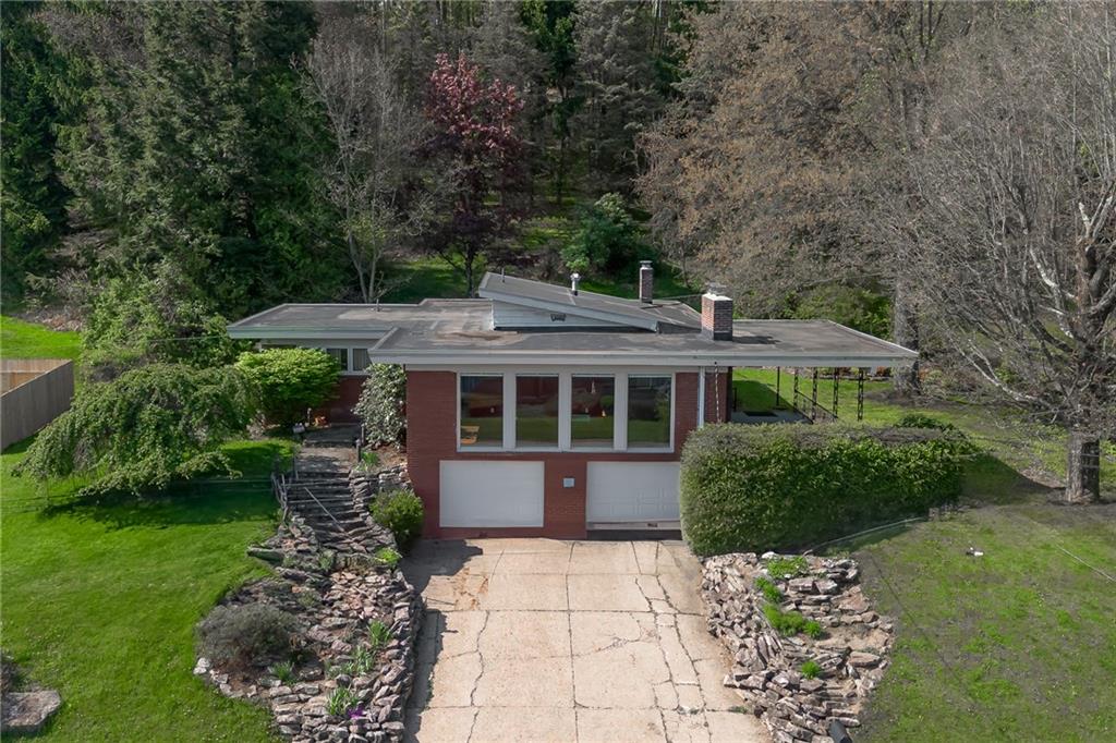 200 Church Avenue Indiana, PA 15701 - Photo 2 of 37 a front view of a house with a garden