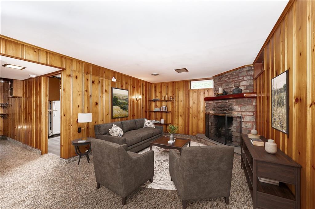 200 Church Avenue Indiana, PA 15701 - Photo 23 of 37 a living room with furniture a fireplace and a flat screen tv