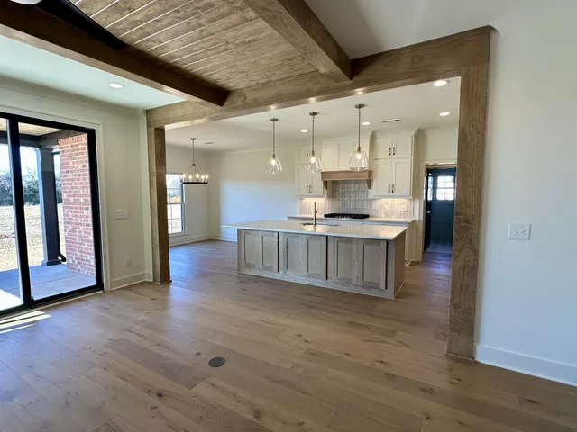 a bathroom with a tub and shower