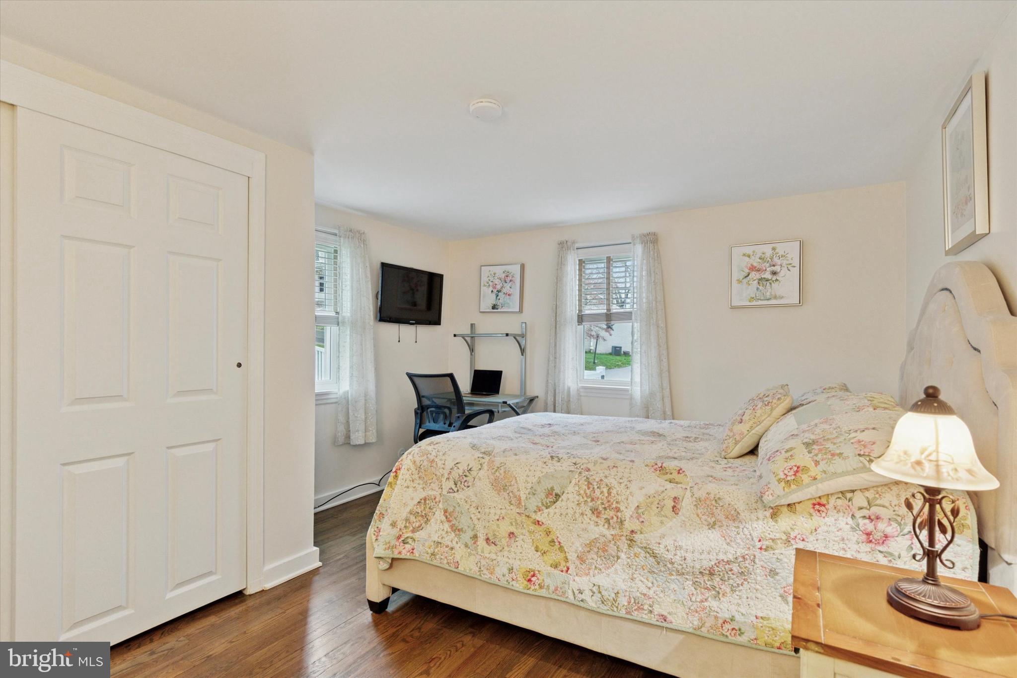 3 Buttonwood Avenue Malvern, PA 19355 - Photo 12 of 25 a bedroom with a bed and a lamp