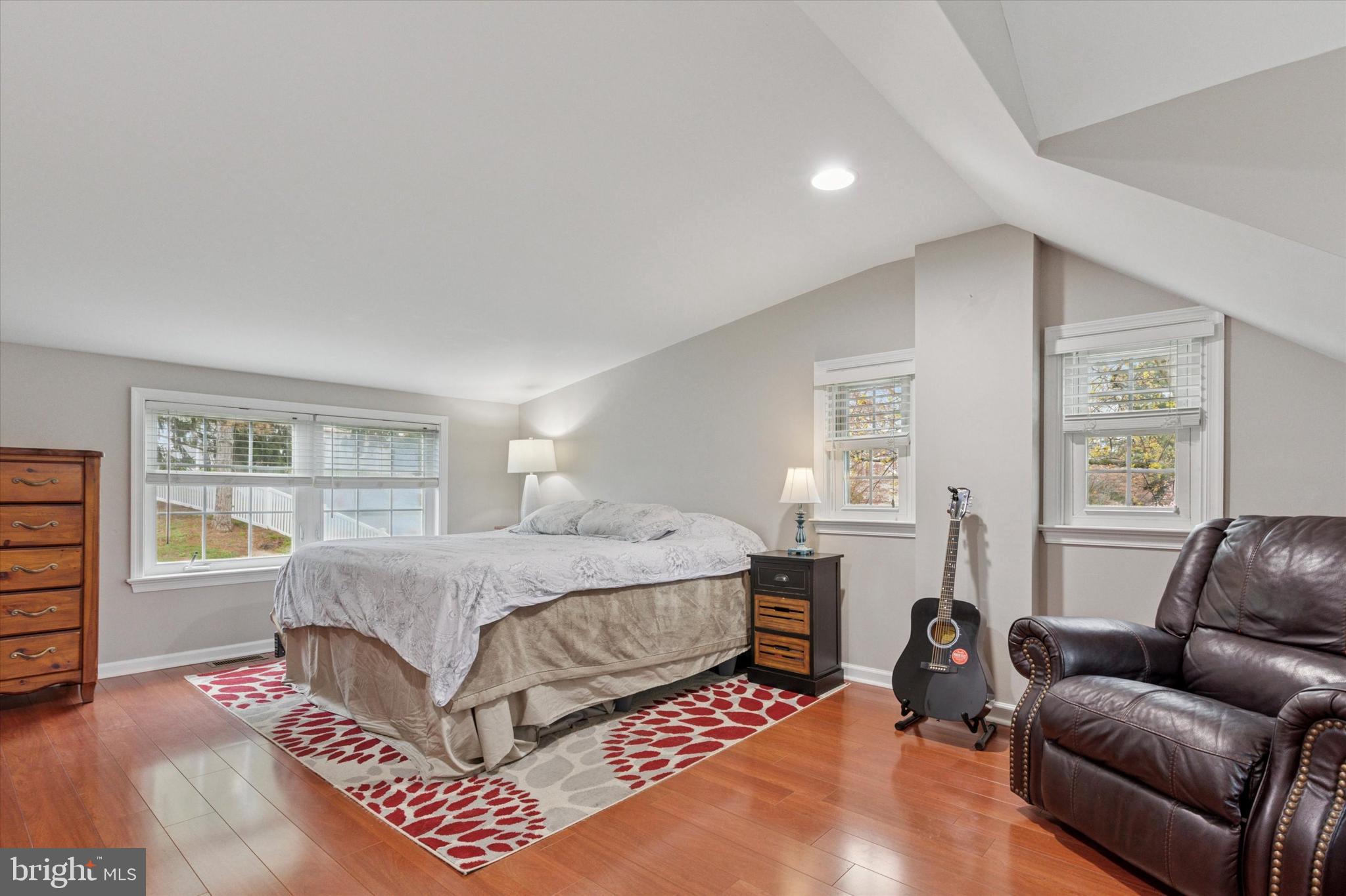 3 Buttonwood Avenue Malvern, PA 19355 - Photo 14 of 25 a bedroom with a bed couch and window