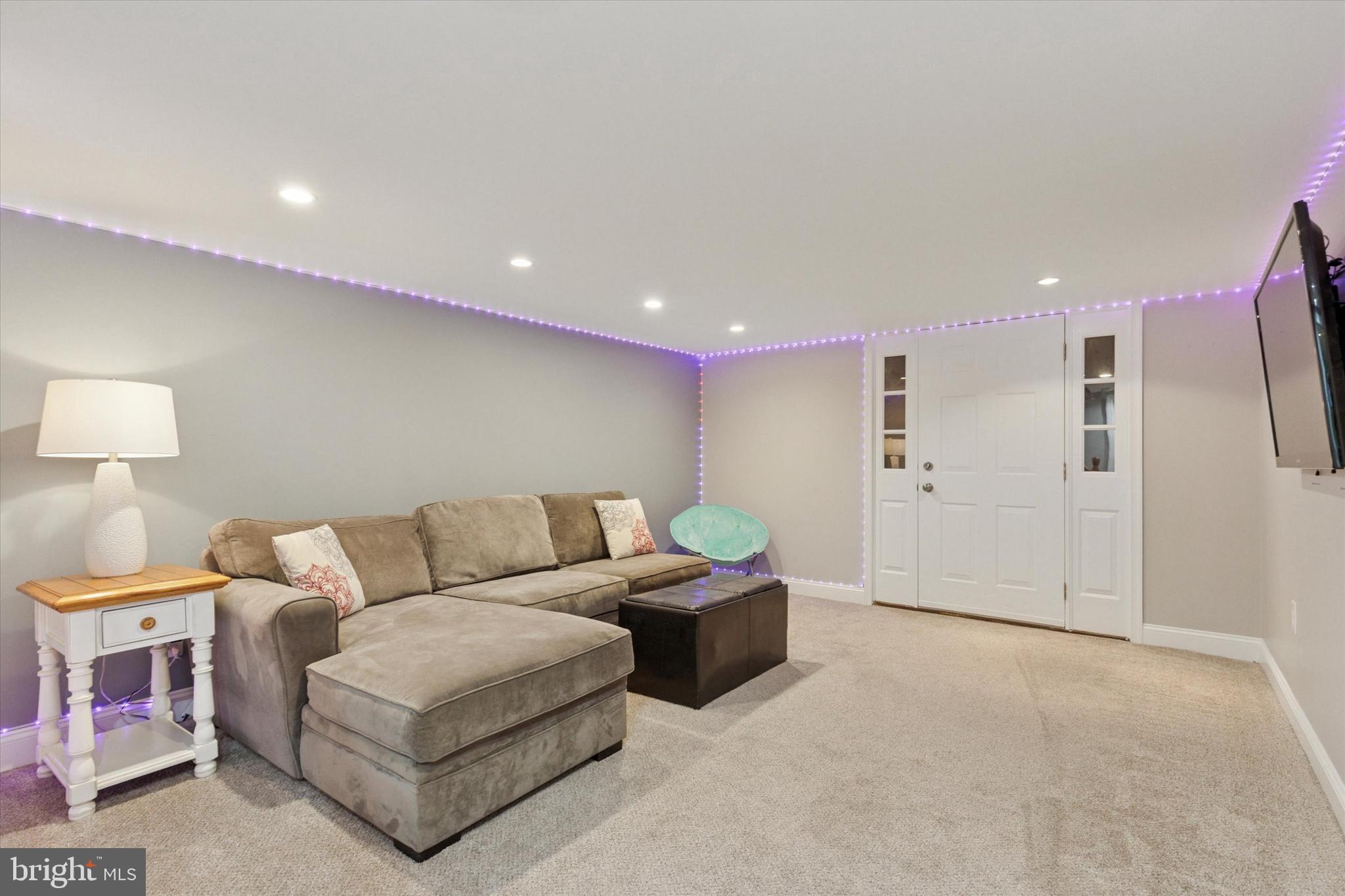 3 Buttonwood Avenue Malvern, PA 19355 - Photo 18 of 25 a living room with furniture and a lamp
