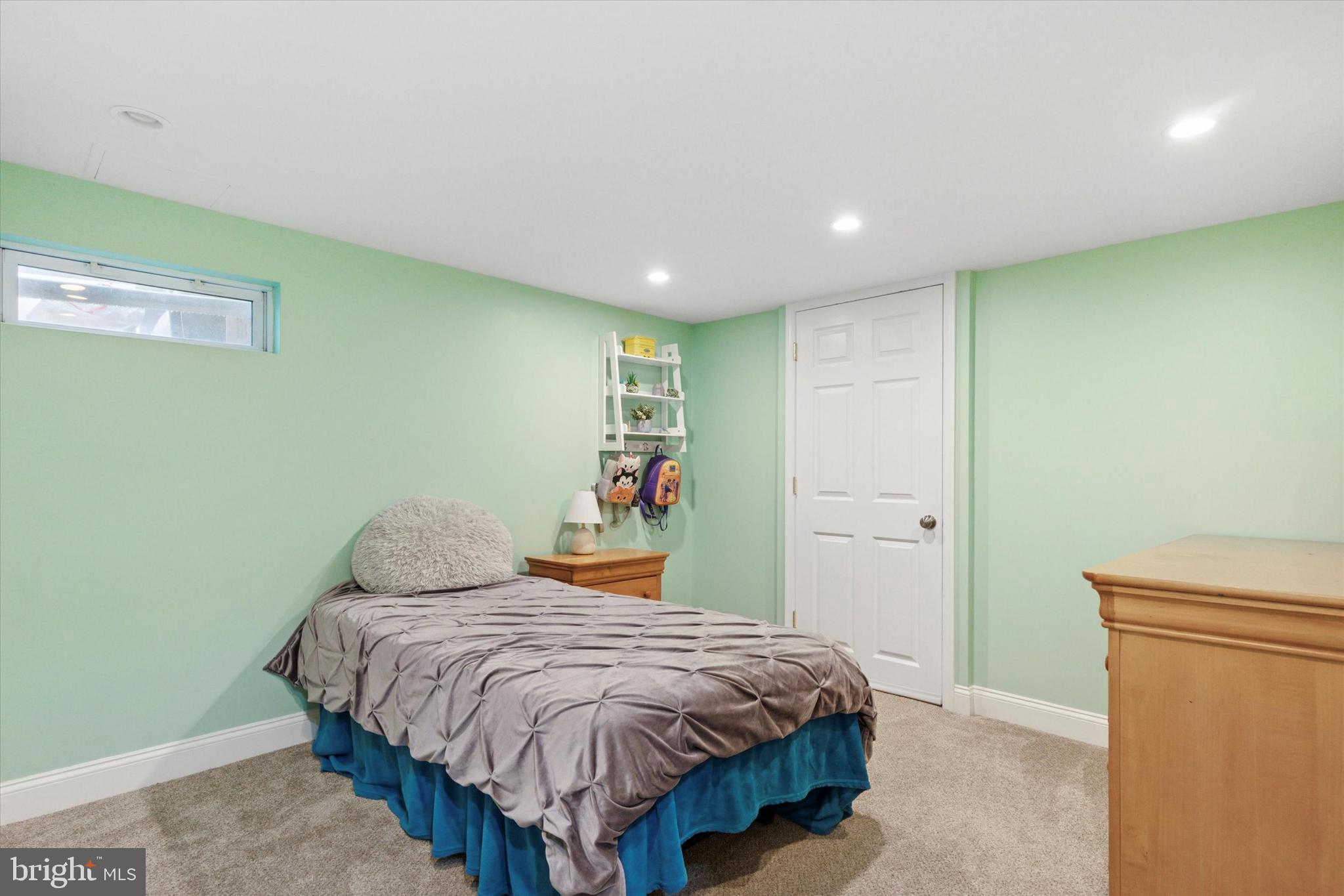 3 Buttonwood Avenue Malvern, PA 19355 - Photo 20 of 25 a bedroom with a bed and a table