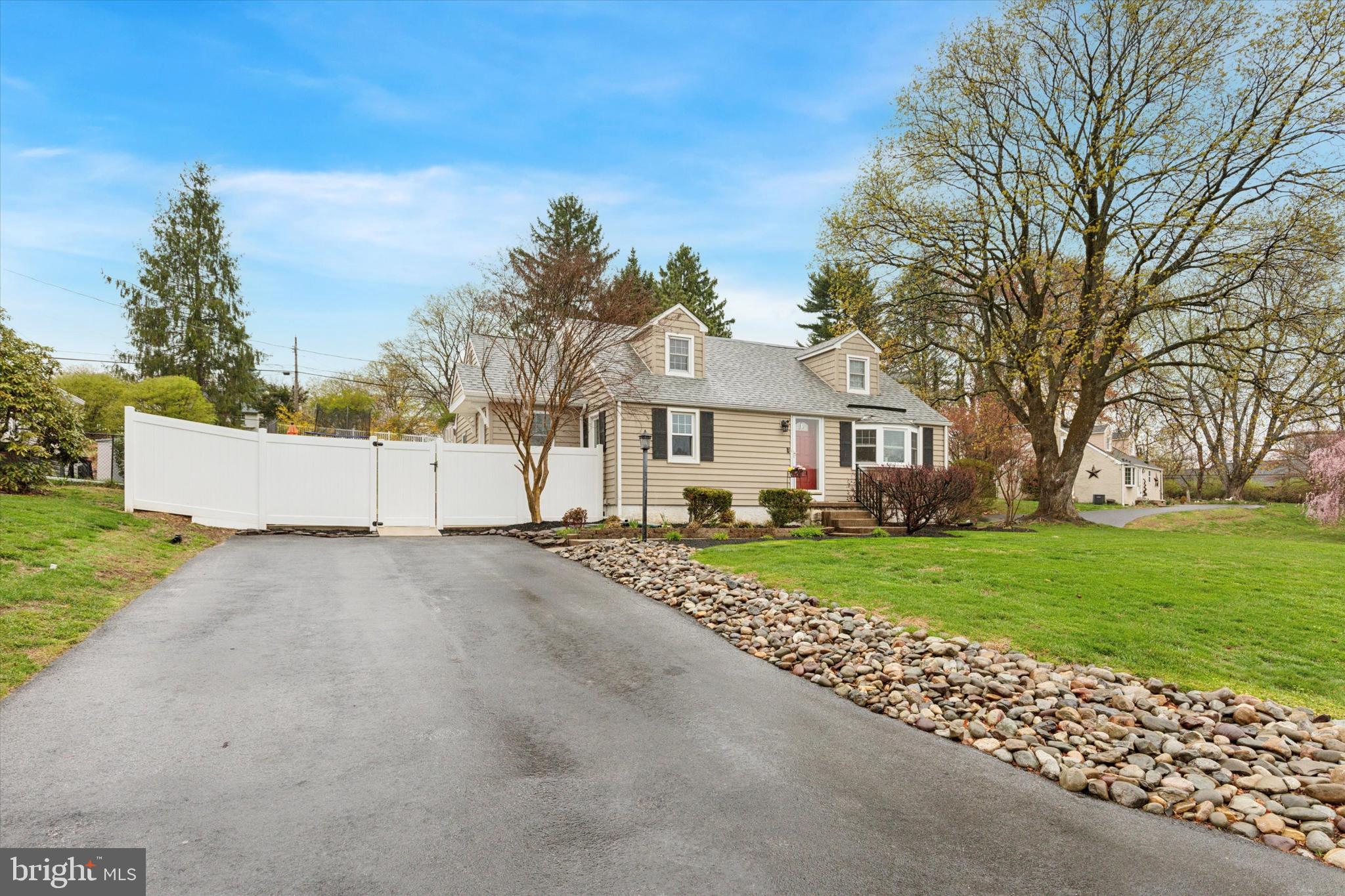 3 Buttonwood Avenue Malvern, PA 19355 - Photo 2 of 25 front view of a house with a yard and an trees