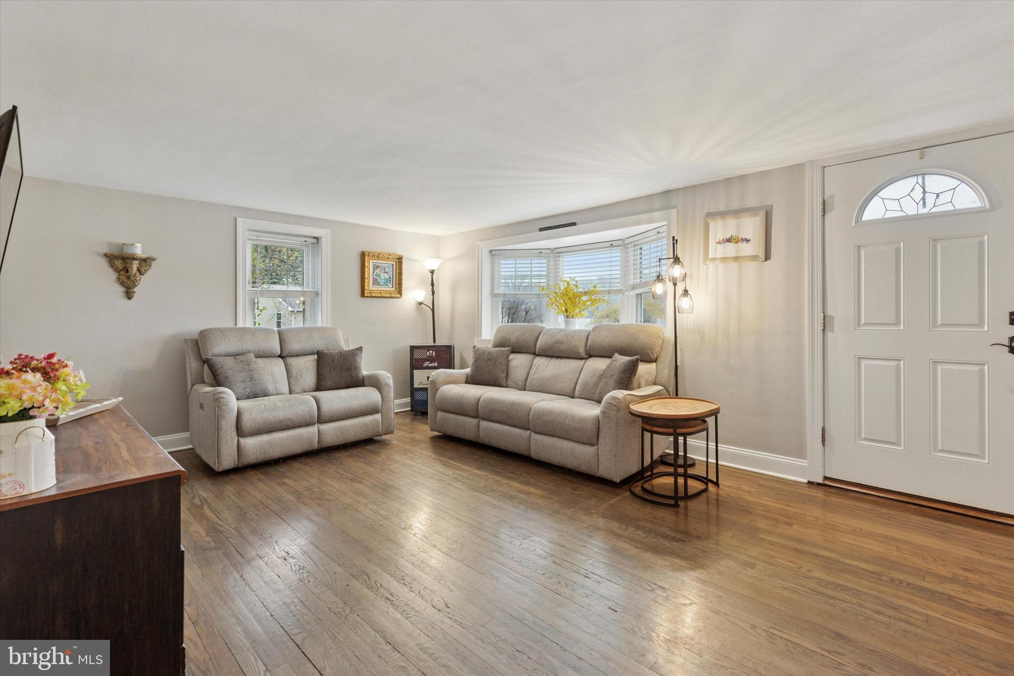 3 Buttonwood Avenue Malvern, PA 19355 - Photo 4 of 25 a living room with furniture and a wooden floor