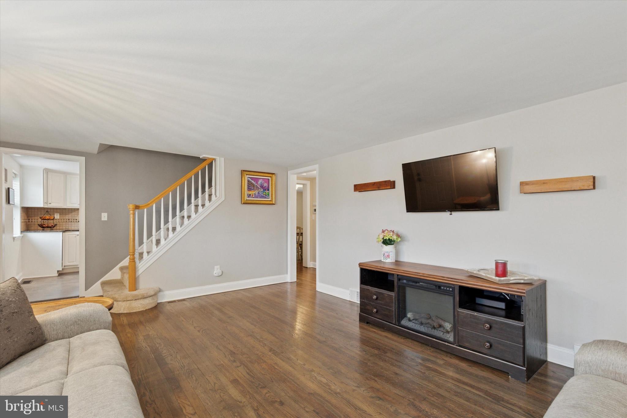 3 Buttonwood Avenue Malvern, PA 19355 - Photo 6 of 25 a living room with furniture and a flat screen tv