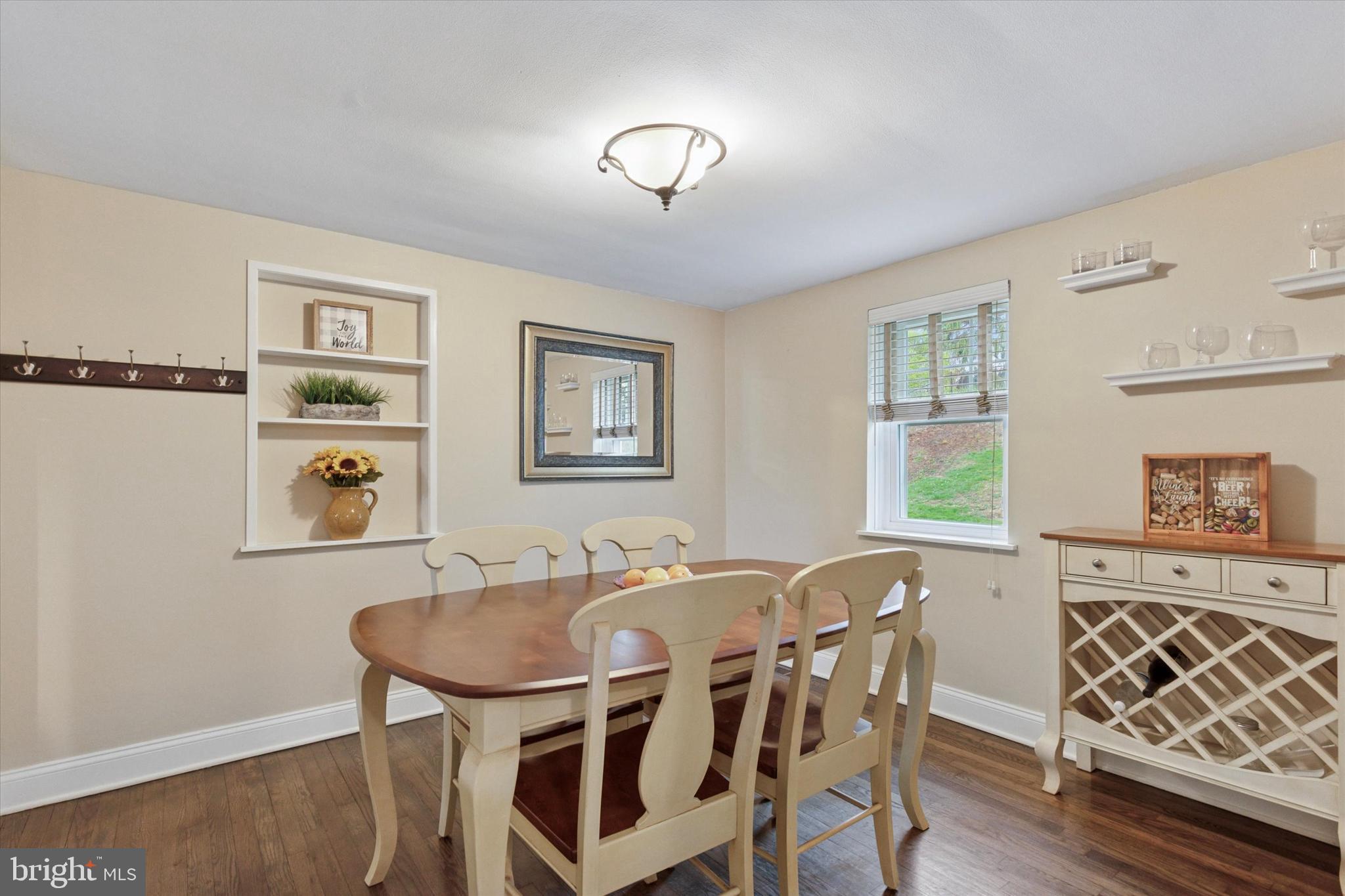 3 Buttonwood Avenue Malvern, PA 19355 - Photo 10 of 25 a view of a dining room with furniture and wooden floor