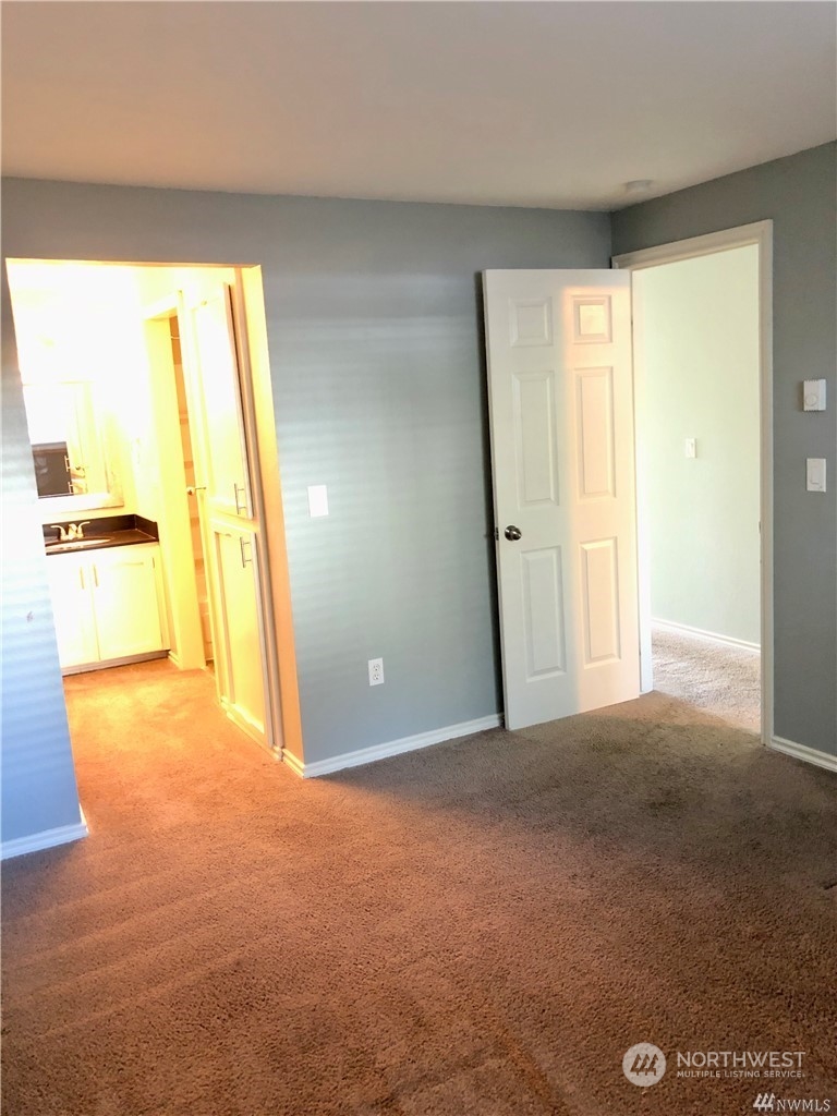 820 Cady Road, Unit B103 Everett, WA 98203 - Photo 13 of 16 a view of an empty room with a window
