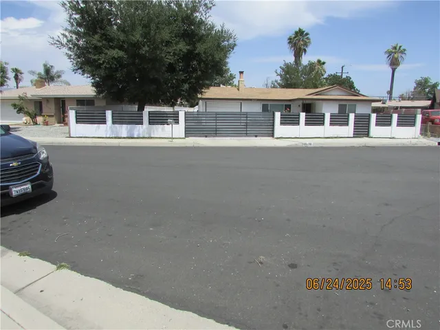 a house view with a garden space