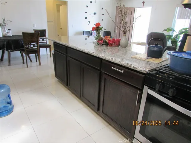 a kitchen with granite countertop lots of counter top space