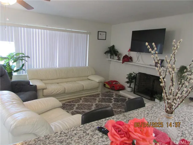 a living room with furniture and a couch