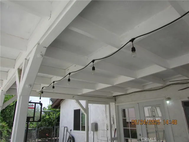 a view of a hallway with bathroom