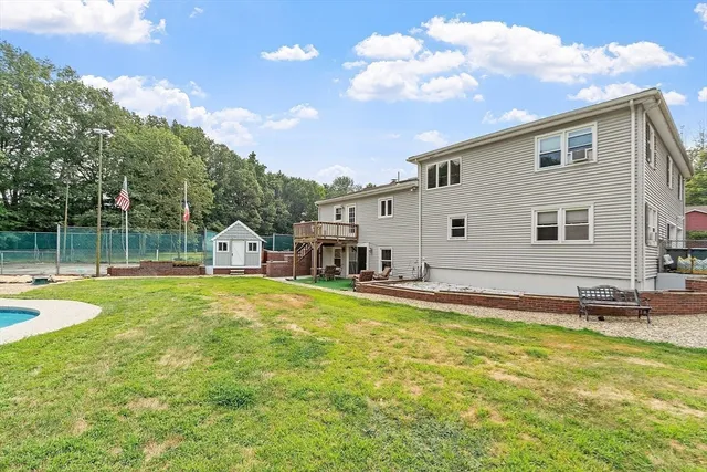 a view of a swimming pool with a patio