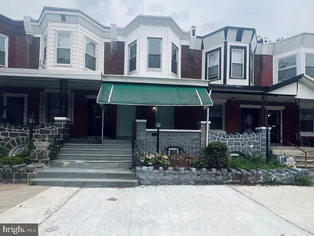 a front view of multiple houses