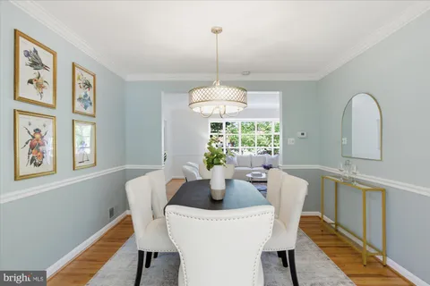 a bedroom with two beds and a table