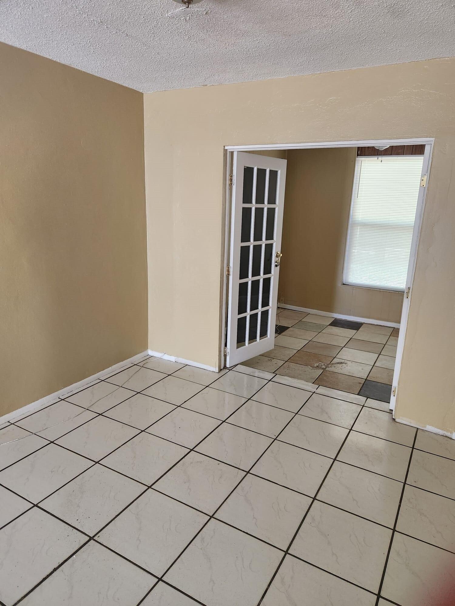 8030 Sunset Strip Sunrise, FL 33322 - Photo 8 of 8 a view of empty room with wooden floor