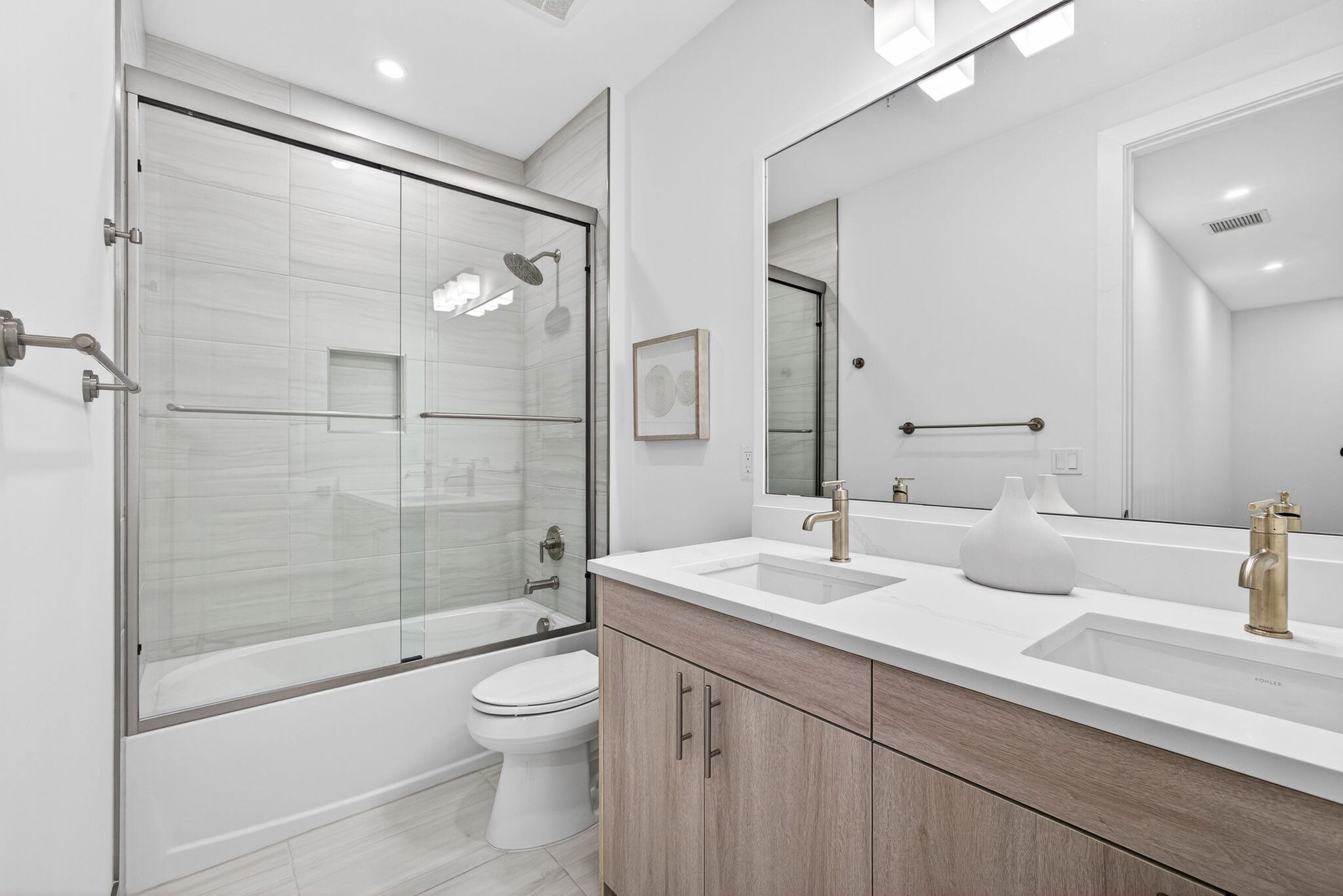 115 Water Pointe Place, Unit 35 Jupiter, FL 33477 - Photo 31 of 42 a bathroom with a sink a toilet and shower