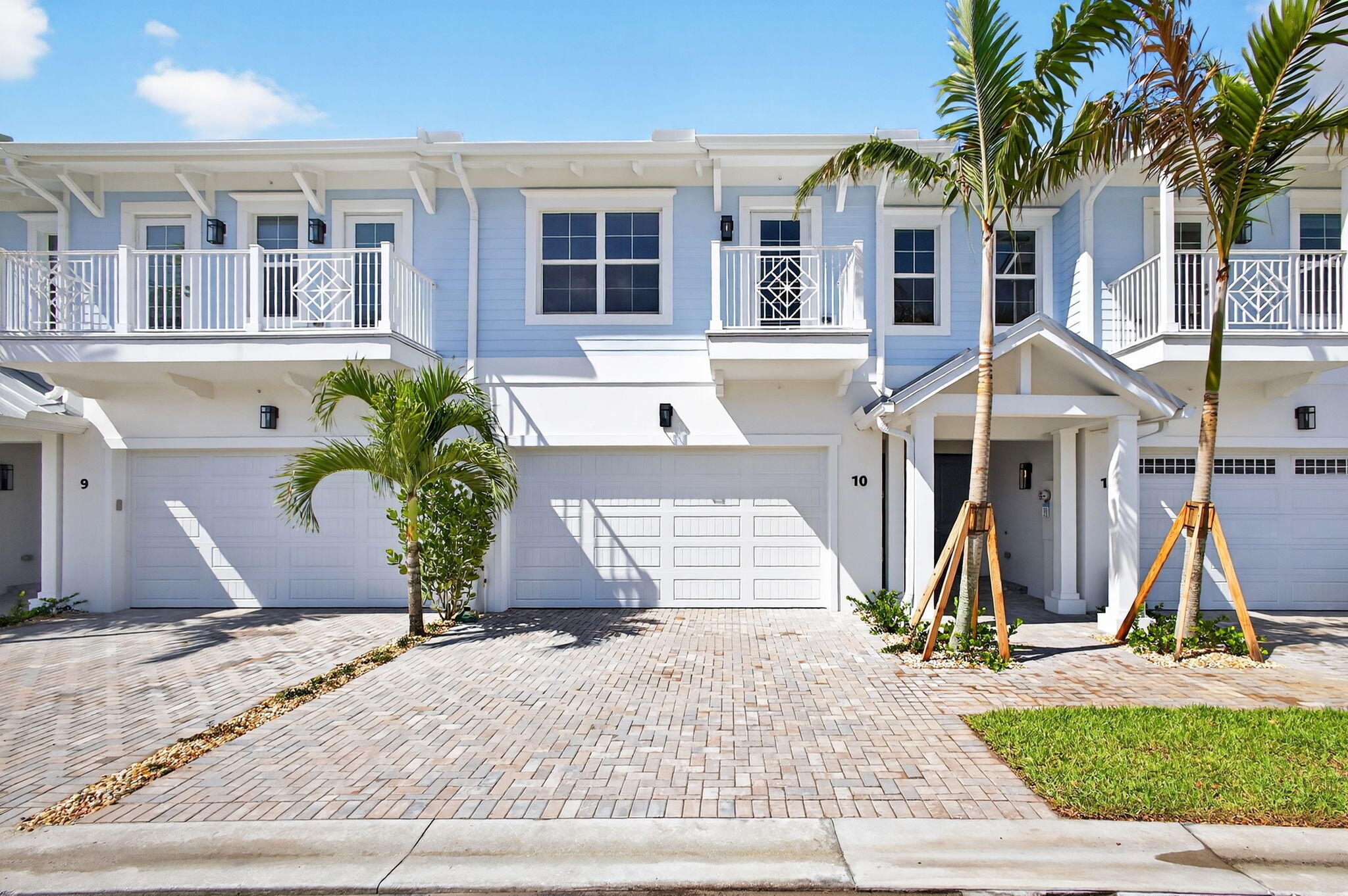 115 Water Pointe Place, Unit 35 Jupiter, FL 33477 - Photo 39 of 42 a front view of a house with a yard