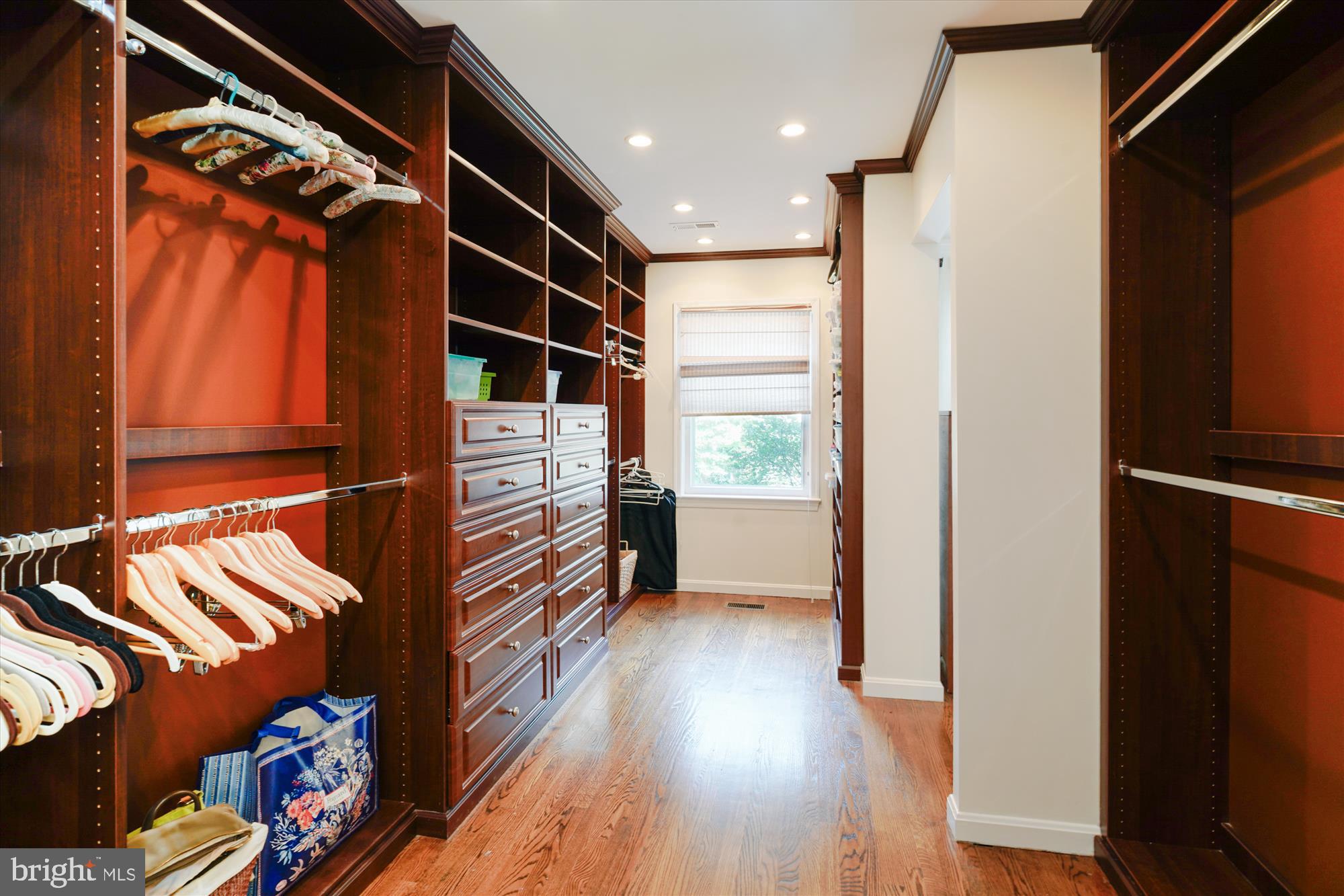 3922 North Glebe Road Arlington, VA 22207 - Photo 29 of 46 a view of walk in closet with clothes and shoes
