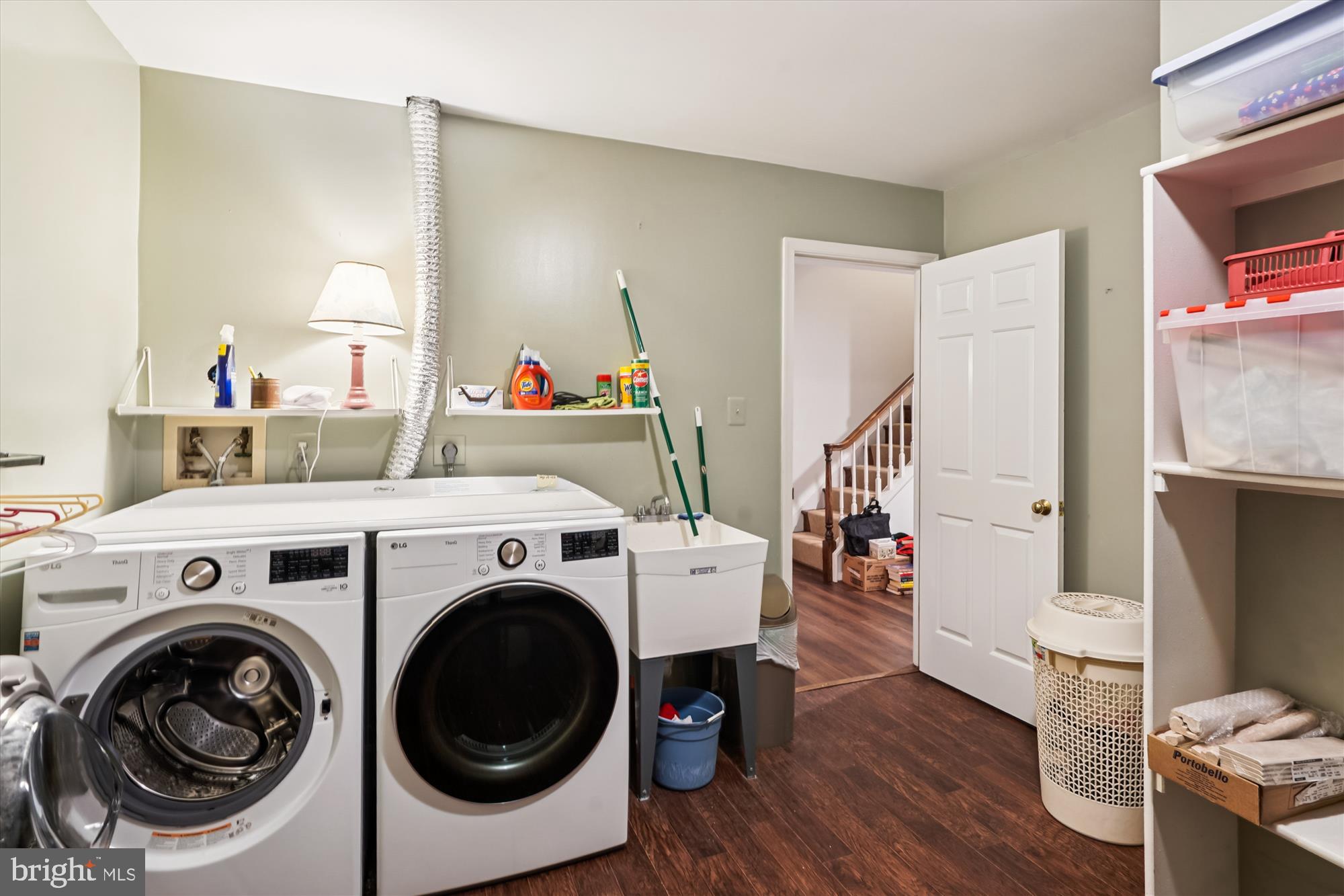 3922 North Glebe Road Arlington, VA 22207 - Photo 44 of 46 a utility room with dryer washer and a view of living room