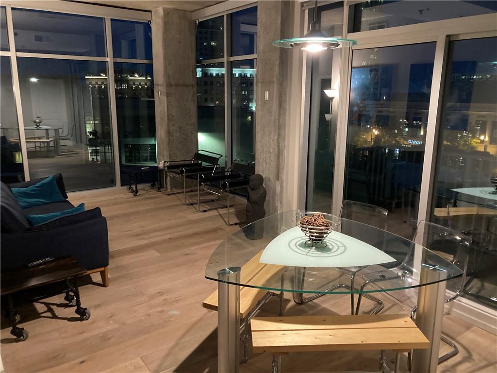 a dining room with table and chairs