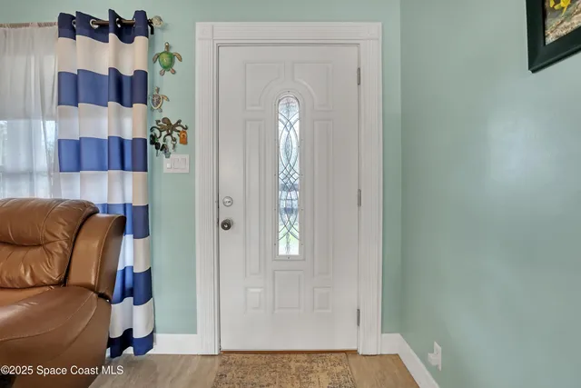 image of a bedroom with a bed and a couch