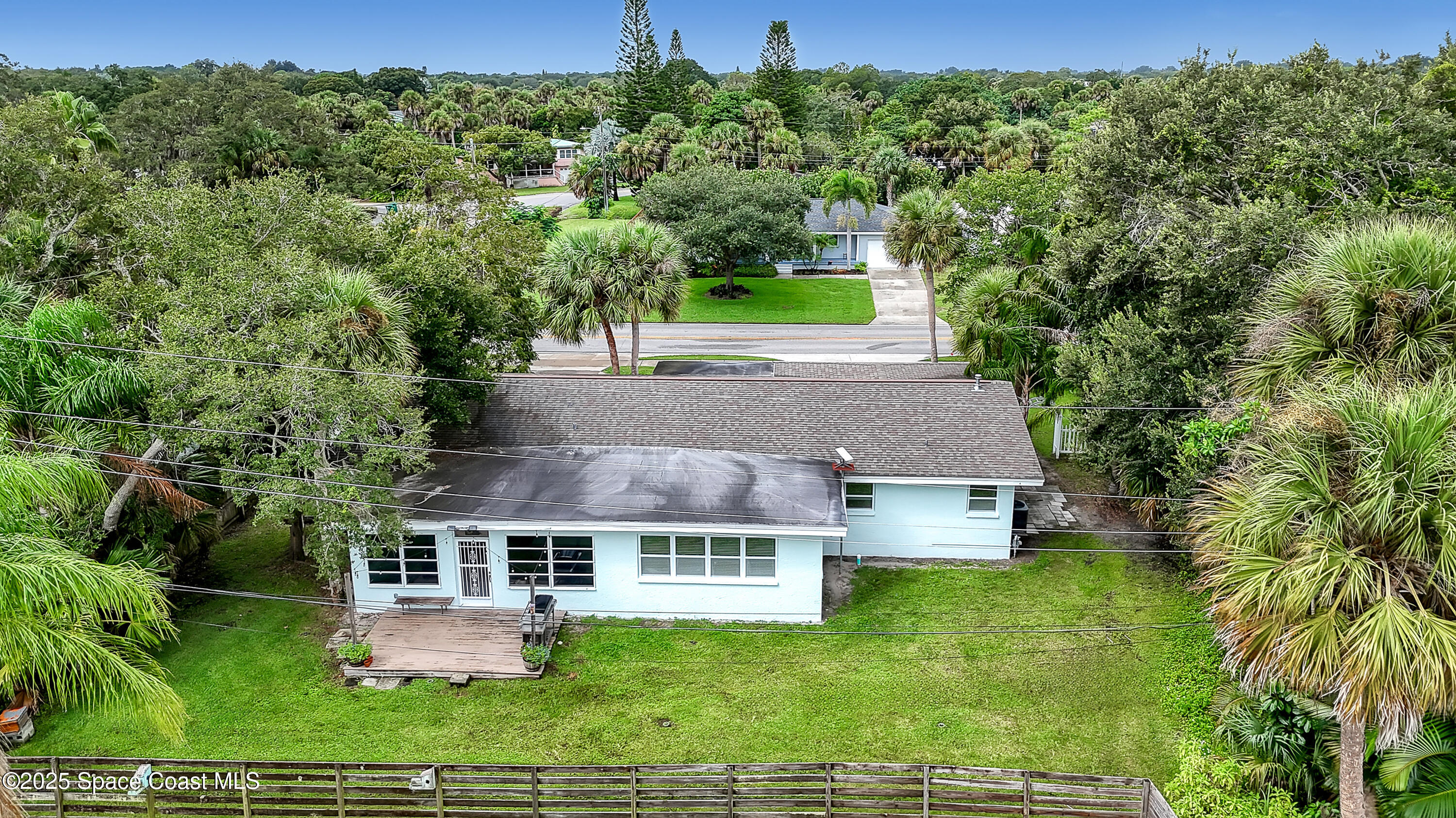 2307 Country Club Road Melbourne, FL 32901 - Photo 43 of 50 an aerial view of a house