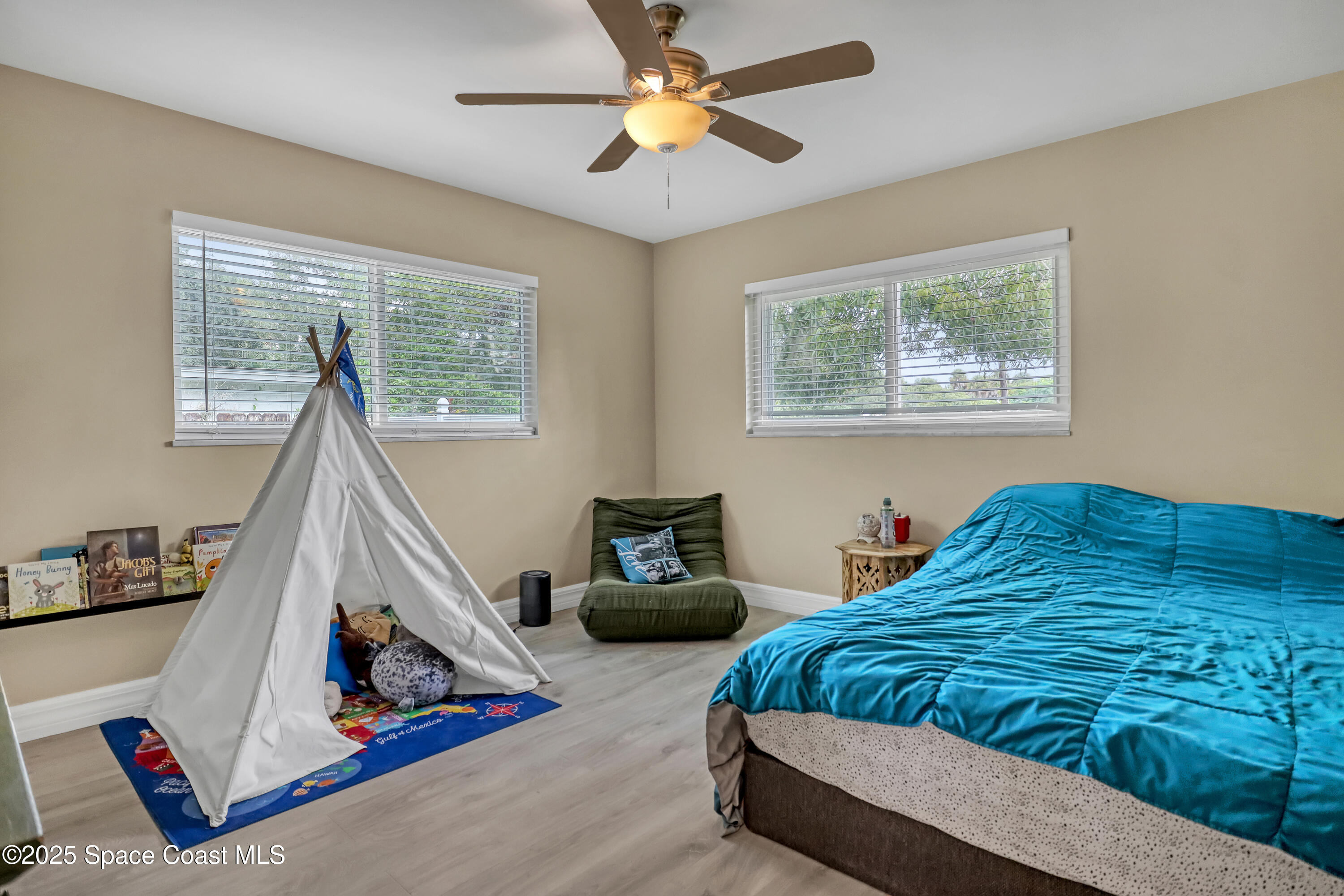 2307 Country Club Road Melbourne, FL 32901 - Photo 48 of 50 a bedroom with bed and a window