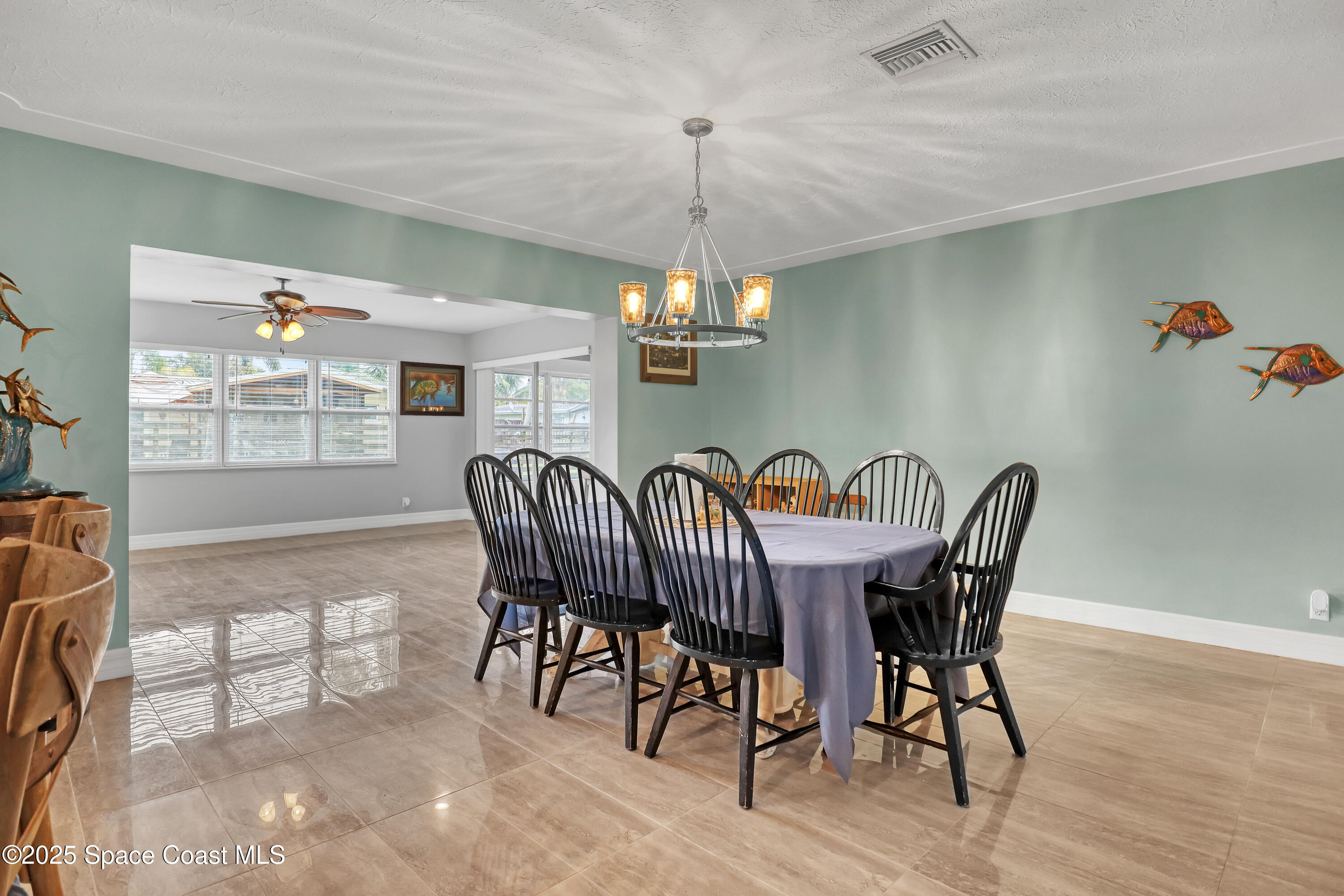 2307 Country Club Road Melbourne, FL 32901 - Photo 7 of 50 a view of a dining room with furniture window and outside view