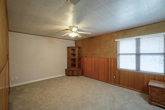 a kitchen with a sink cabinets and appliances