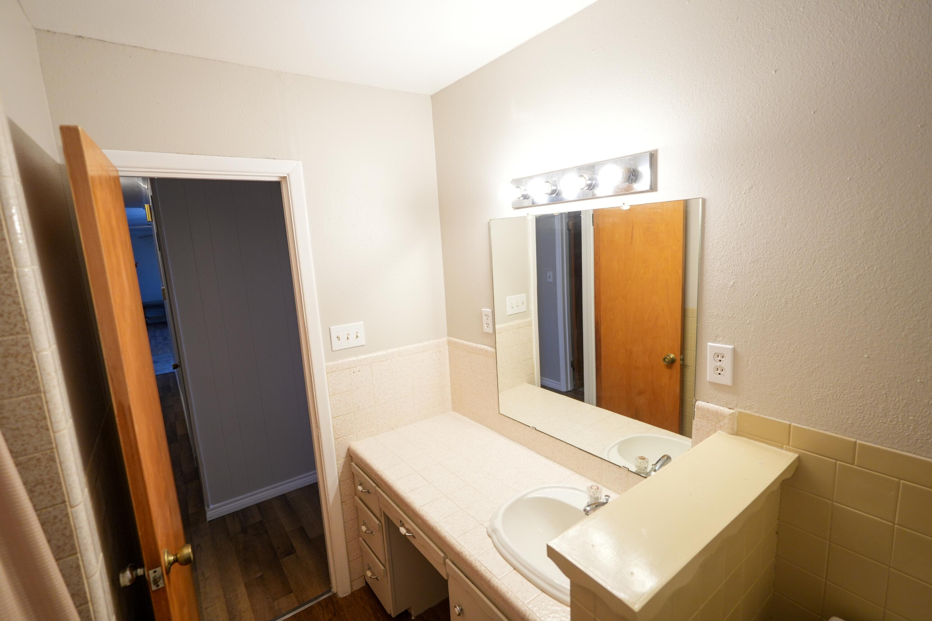 3391 Fisher Road Levelland, TX 79336 - Photo 28 of 47 a view of a kitchen from door