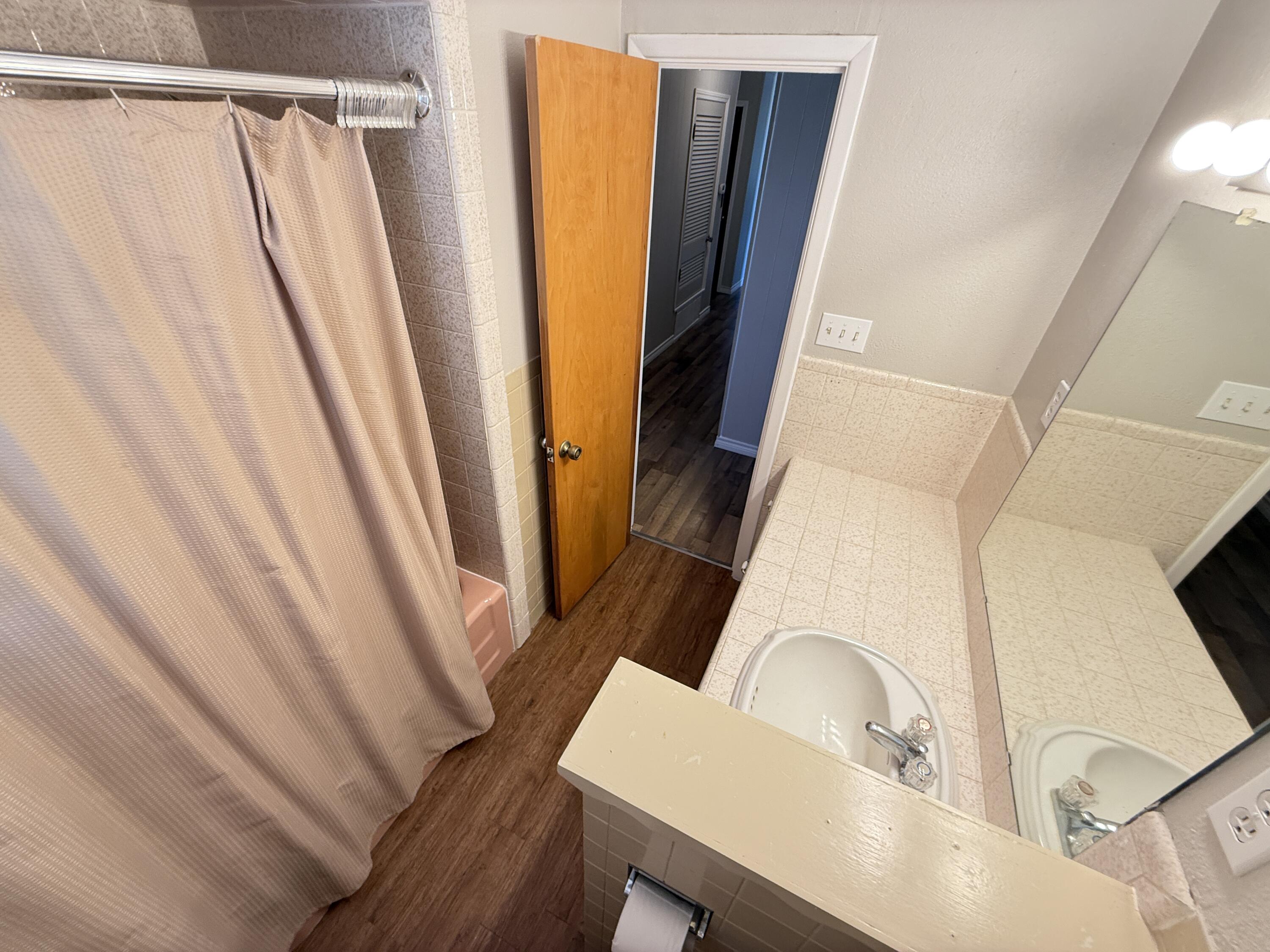 3391 Fisher Road Levelland, TX 79336 - Photo 29 of 47 a view of balcony and wooden floor