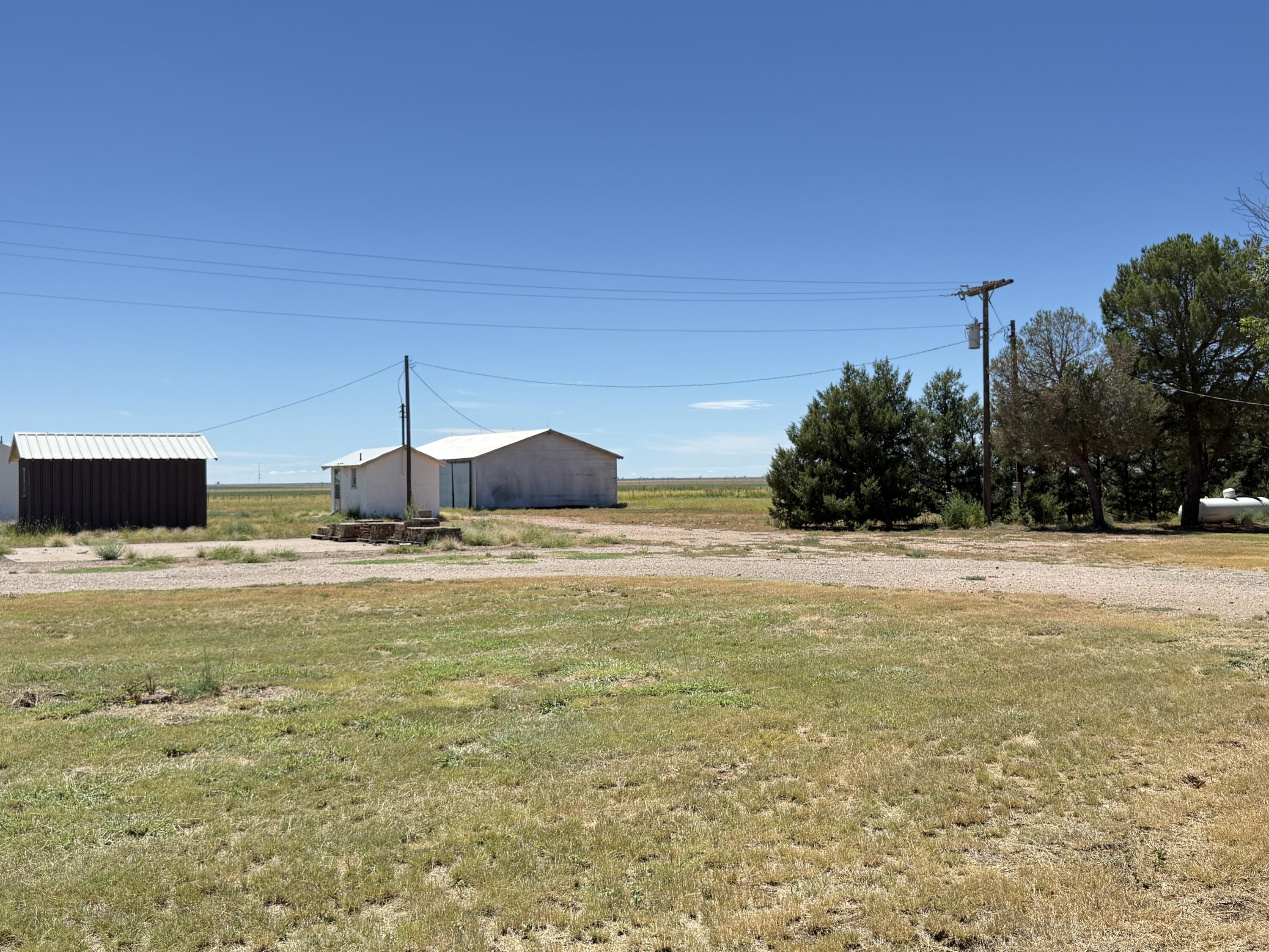 3391 Fisher Road Levelland, TX 79336 - Photo 44 of 47 a house with pool in front of it