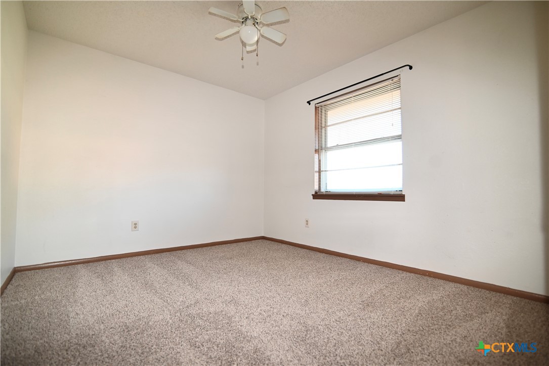 928 Randa Street Copperas Cove, TX 76522 - Photo 11 of 19 an empty room with a window