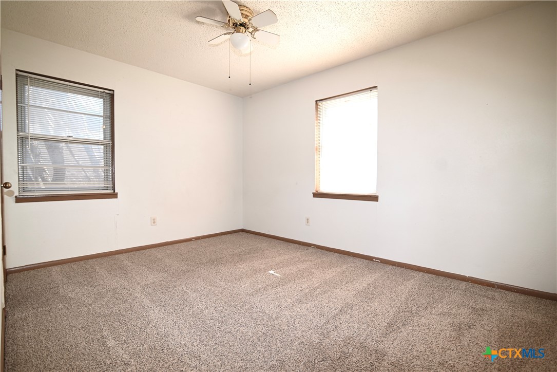 928 Randa Street Copperas Cove, TX 76522 - Photo 9 of 19 an empty room with a window