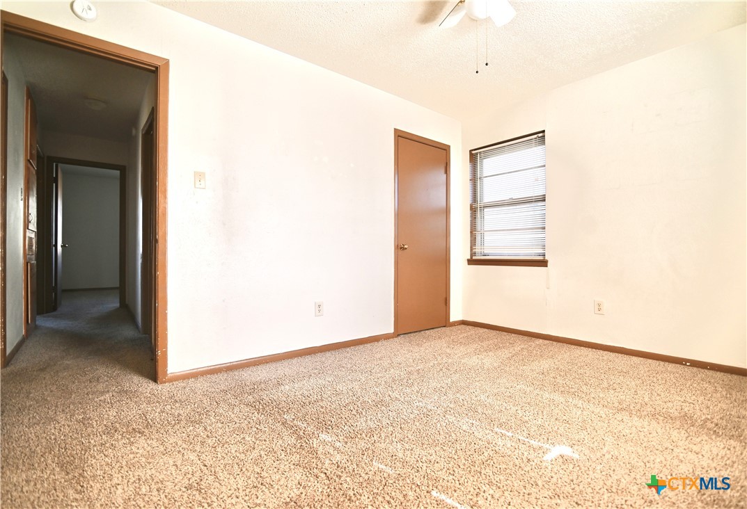 928 Randa Street Copperas Cove, TX 76522 - Photo 10 of 19 a view of an empty room with a window