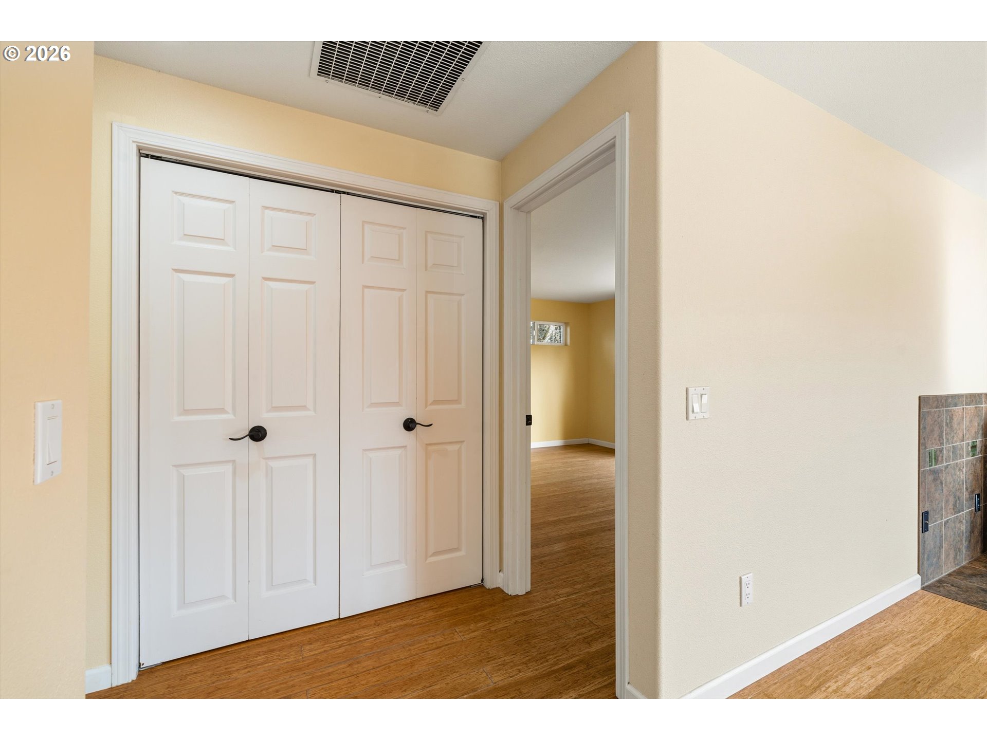 30303 Bellfountain Road Corvallis, OR 97333 - Photo 15 of 47 a view of a hallway with wooden floor