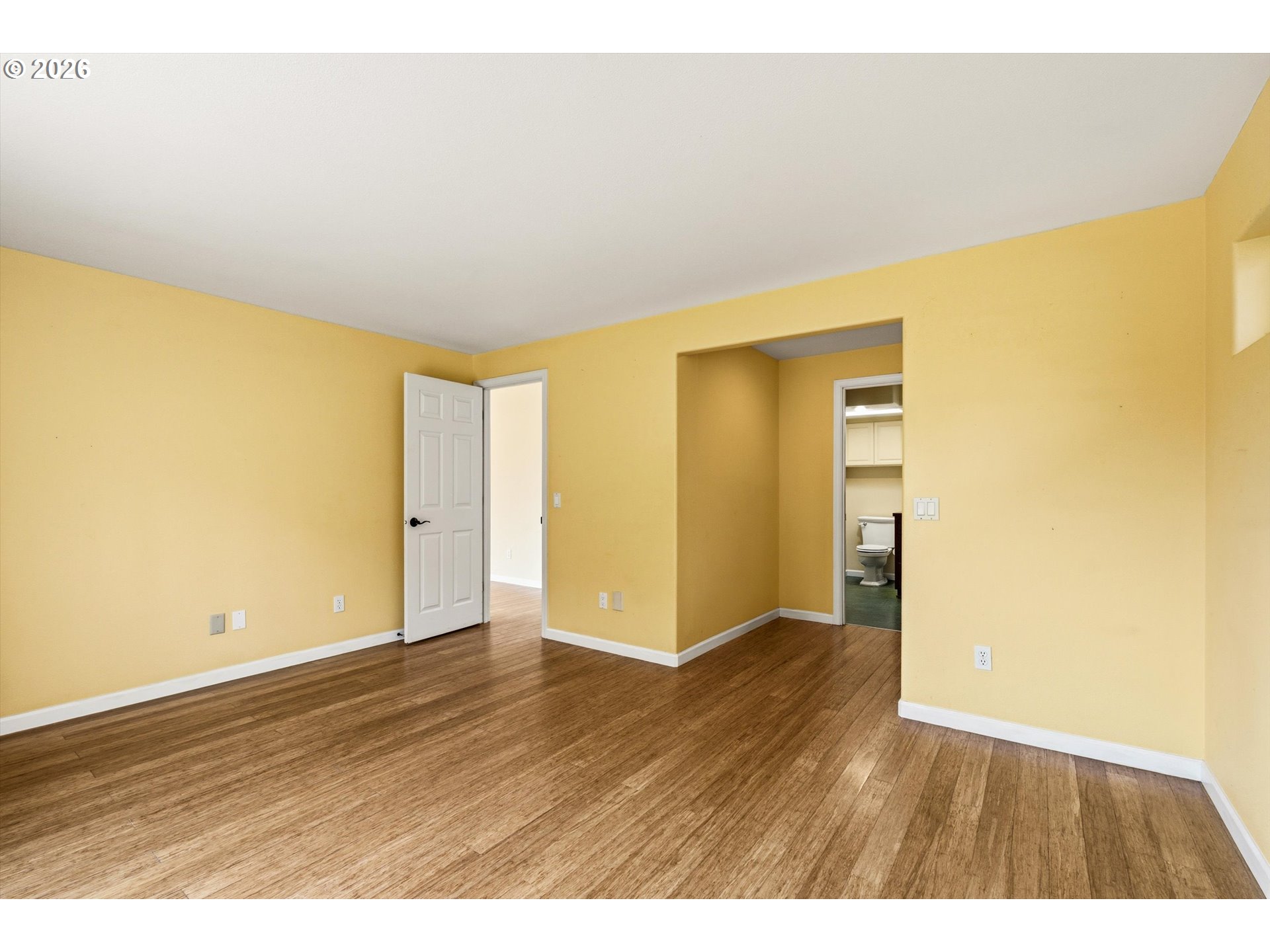 30303 Bellfountain Road Corvallis, OR 97333 - Photo 18 of 47 a view of an empty room with wooden floor