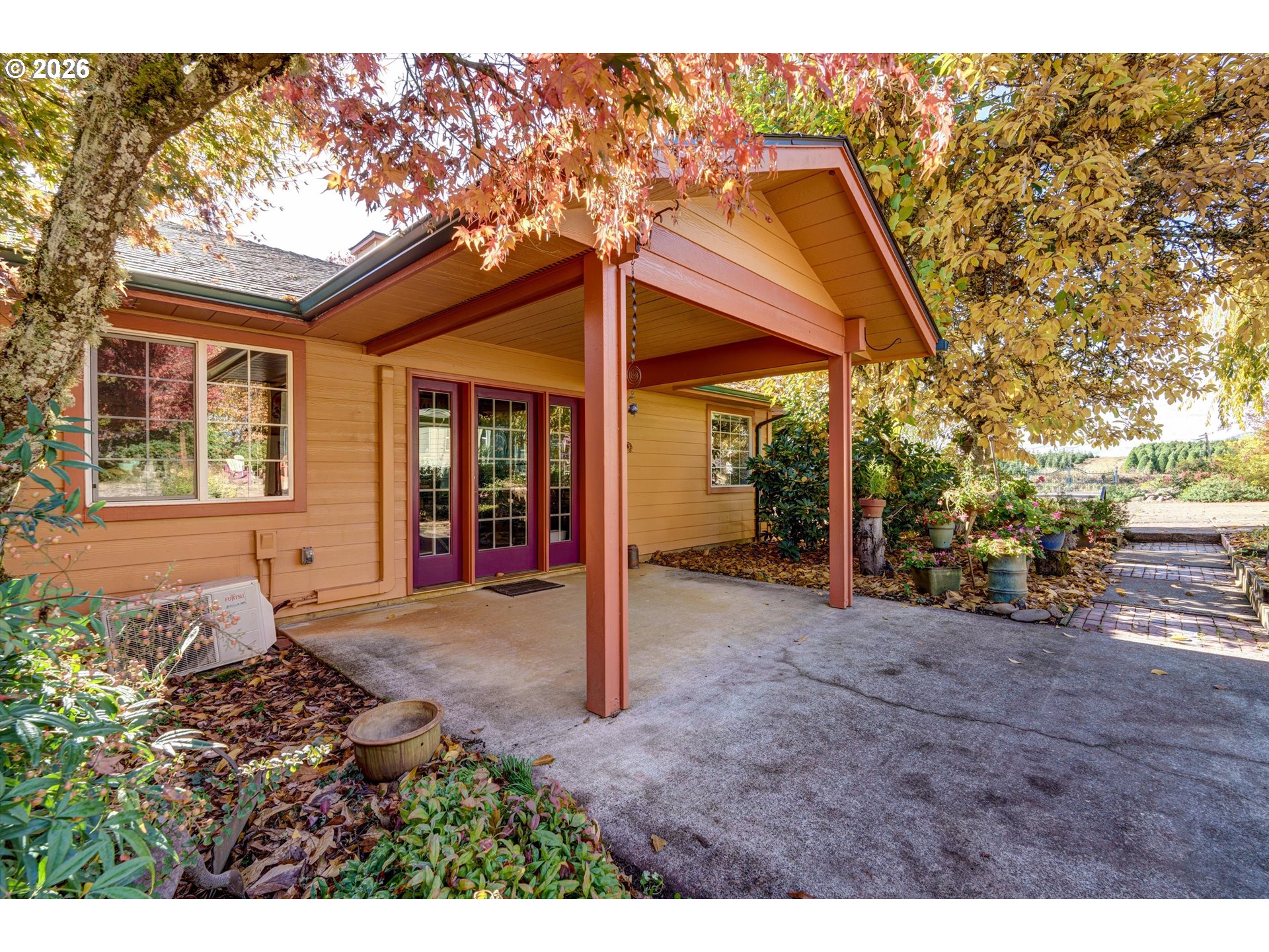 30303 Bellfountain Road Corvallis, OR 97333 - Photo 31 of 47 a backyard of a house with table and chairs