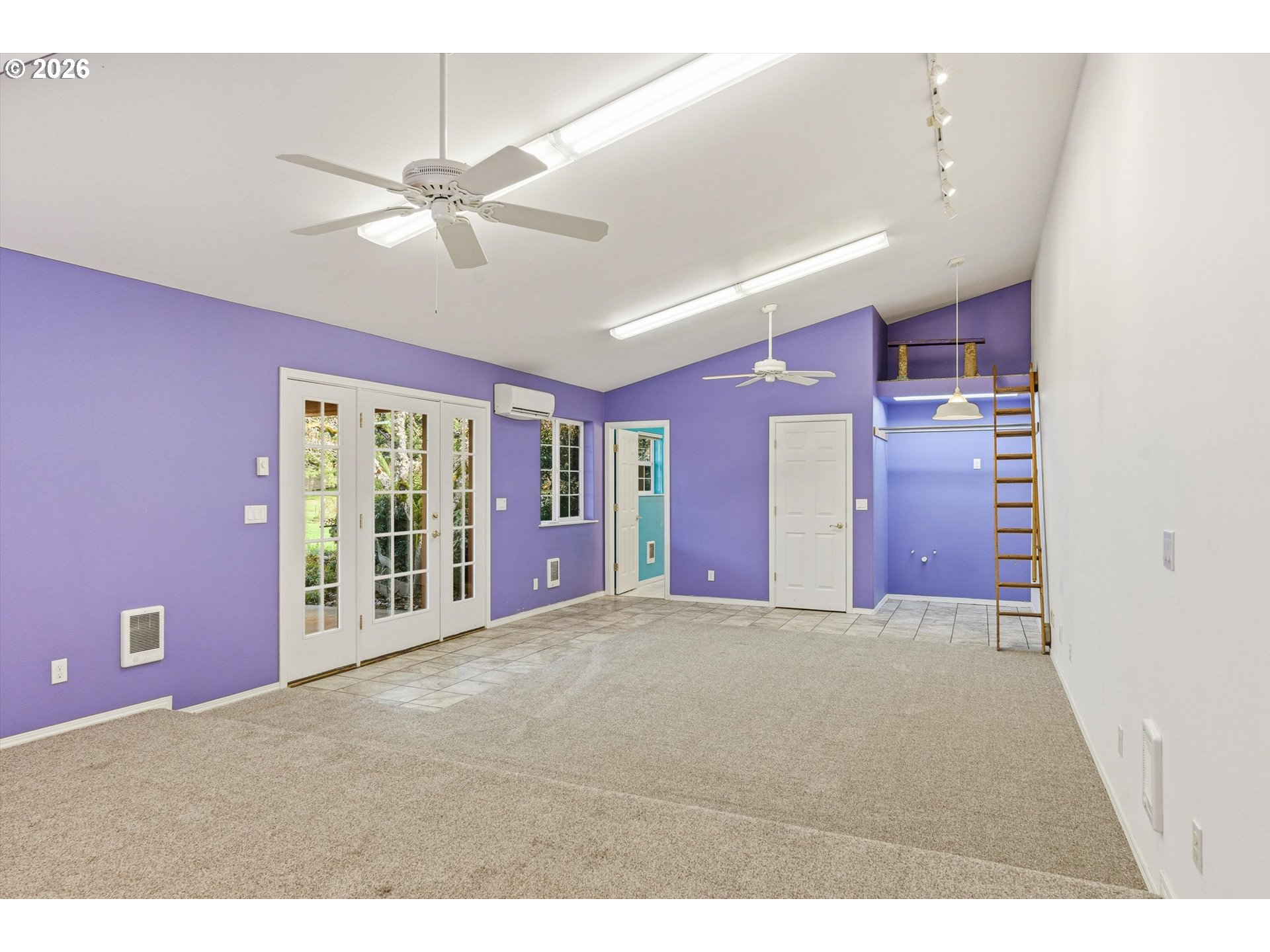 30303 Bellfountain Road Corvallis, OR 97333 - Photo 33 of 47 a view of an empty room with closet and chandelier fan