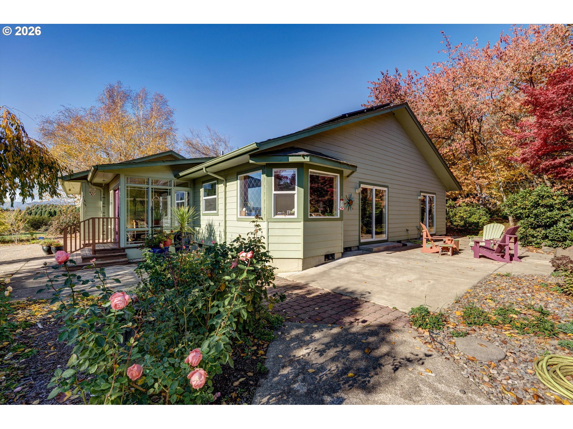30303 Bellfountain Road Corvallis, OR 97333 - Photo 5 of 47 a front view of a house with a garden