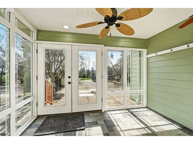 a view of entryway with a front door