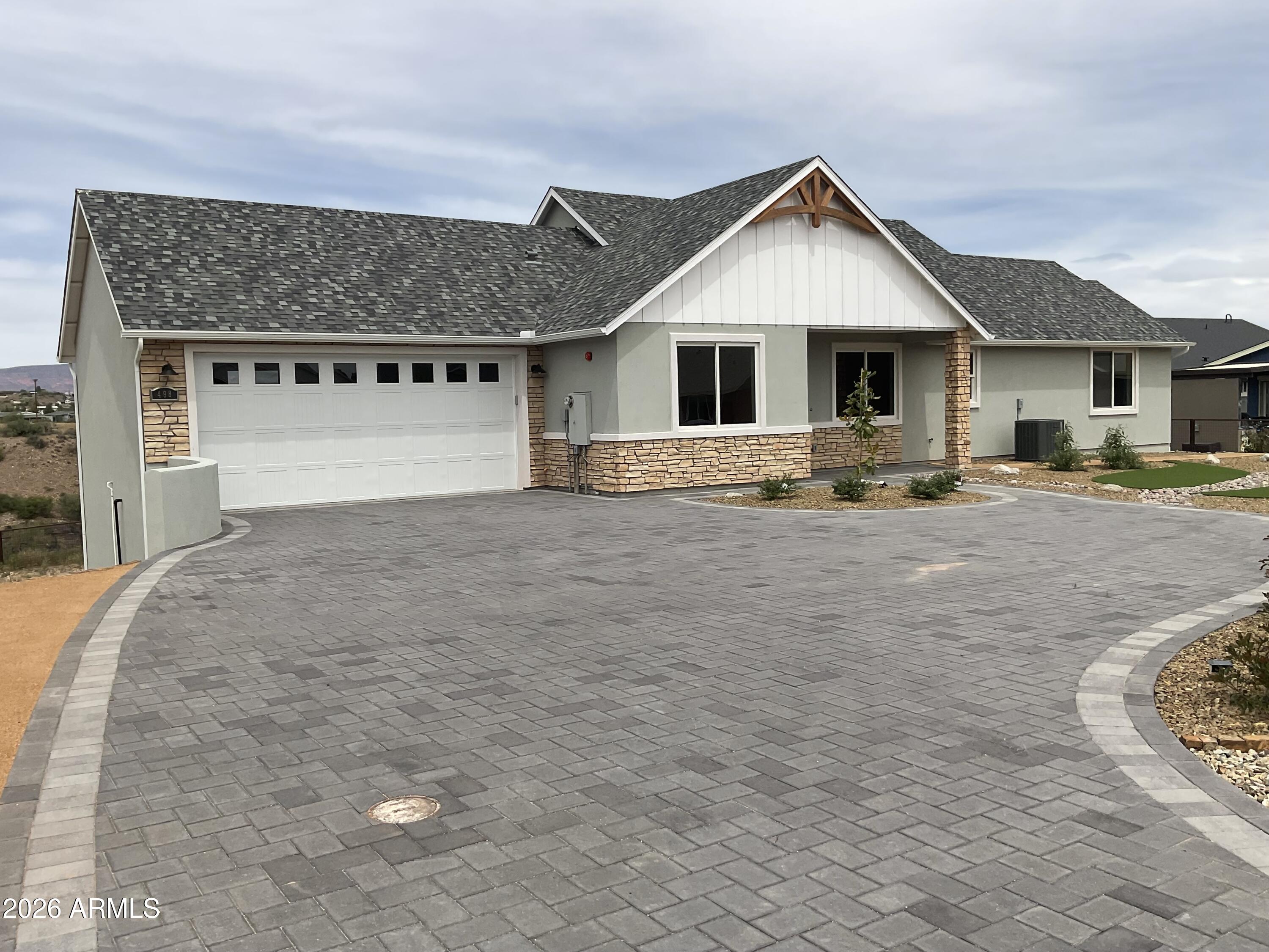 498 Kindra Heights Road Cottonwood, AZ 86326 - Photo 1 of 37 a front view of a house with a yard